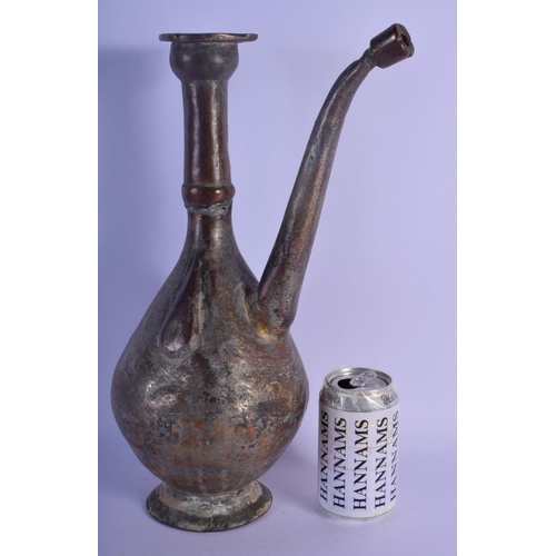 340 - AN EARLY ISLAMIC PERSIAN MIDDLE EASTERN MIXED ALLOY EWER overlaid with simple motifs. 40 cm high.