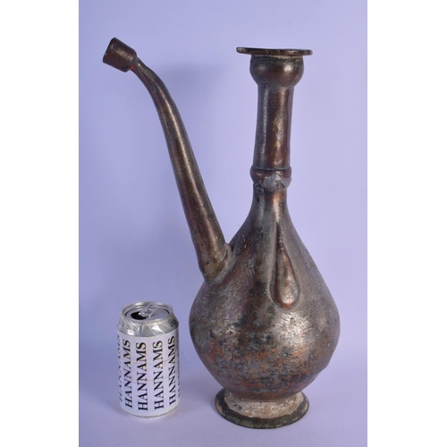 340 - AN EARLY ISLAMIC PERSIAN MIDDLE EASTERN MIXED ALLOY EWER overlaid with simple motifs. 40 cm high.