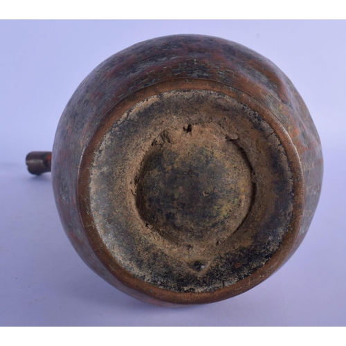 340 - AN EARLY ISLAMIC PERSIAN MIDDLE EASTERN MIXED ALLOY EWER overlaid with simple motifs. 40 cm high.