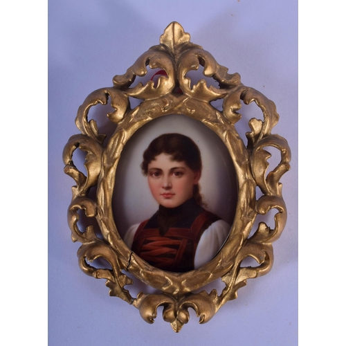 342 - AN ANTIQUE GERMAN PORCELAIN PAINTED PLAQUE within a Florentine frame. 16 cm x 10 cm.