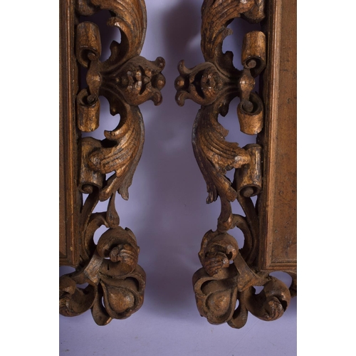 345 - A PAIR OF 19TH CENTURY CONTINENTAL CARVED AND GILDED WOOD MIRRORS of naturalistic form. 32 cm x 26 c... 