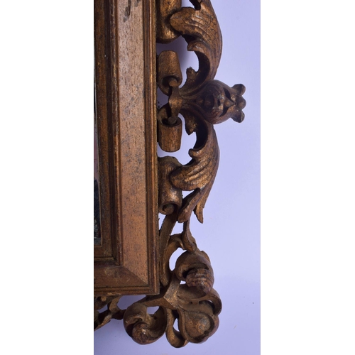 345 - A PAIR OF 19TH CENTURY CONTINENTAL CARVED AND GILDED WOOD MIRRORS of naturalistic form. 32 cm x 26 c... 