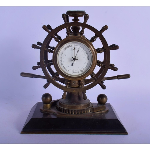 349 - A RARE 19TH CENTURY EUROPEAN INDUSTRIAL SHIPS WHEEL CLOCK with revolving base and inset barometer & ... 