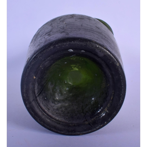 35 - AN EARLY BENEDICTINE GREEN GLASS BOTTLE. 24 cm high.