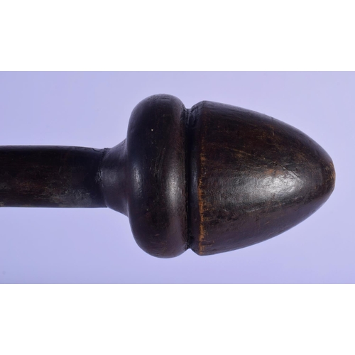 354 - A TRIBAL CARVED WOOD PHALLIC TERMINAL MUSHROOM CLUB. 69 cm long.