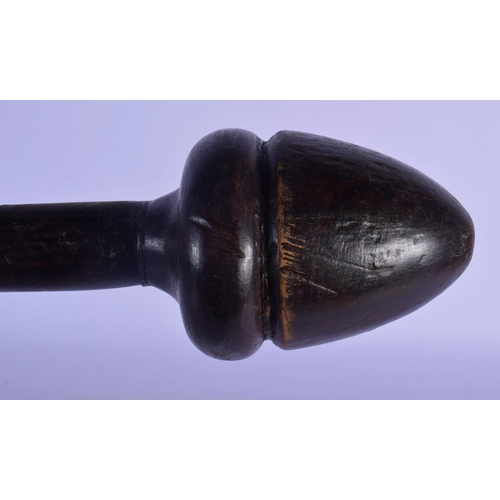 354 - A TRIBAL CARVED WOOD PHALLIC TERMINAL MUSHROOM CLUB. 69 cm long.