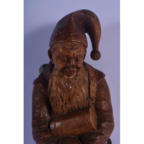 359 - A RARE 19TH CENTURY BAVARIAN BLACK FOREST GNOME COAT HOOK. 36 cm long.