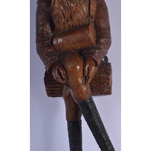 359 - A RARE 19TH CENTURY BAVARIAN BLACK FOREST GNOME COAT HOOK. 36 cm long.