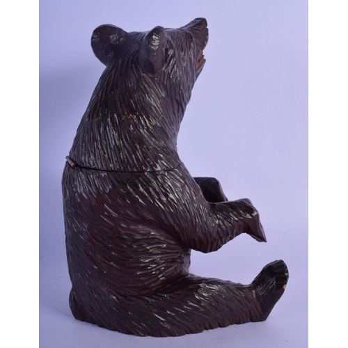 360 - AN ANTIQUE BAVARIAN BLACK FOREST BEAR TOBACCO JAR. 24 cm high.