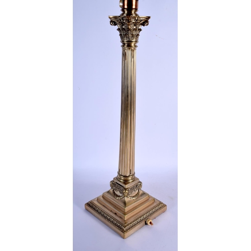 361 - AN ANTIQUE COUNTRY HOUSE SILVER PLATED CORINTHIAN COLUMN LAMP. 76 cm high inc shade.