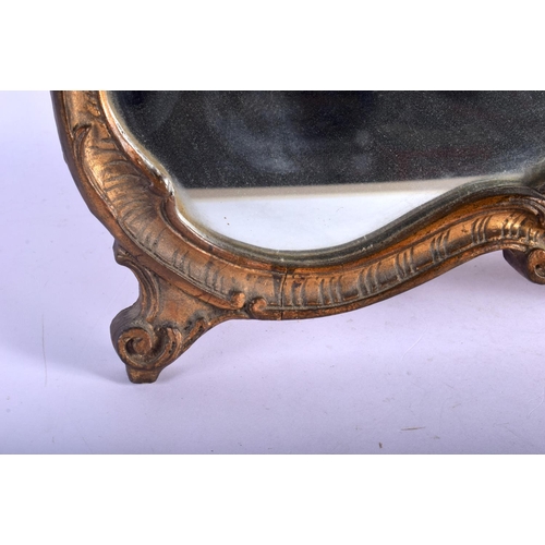 363 - A VINTAGE COUNTRY HOUSE GILTWOOD SCROLLING STRUT MIRROR. 52 cm x 42 cm.