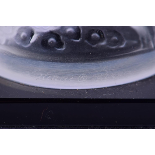 37 - A LOVELY FRENCH LALIQUE GLASS SEATED NUDE PAPER WEIGHT. 9 cm high.