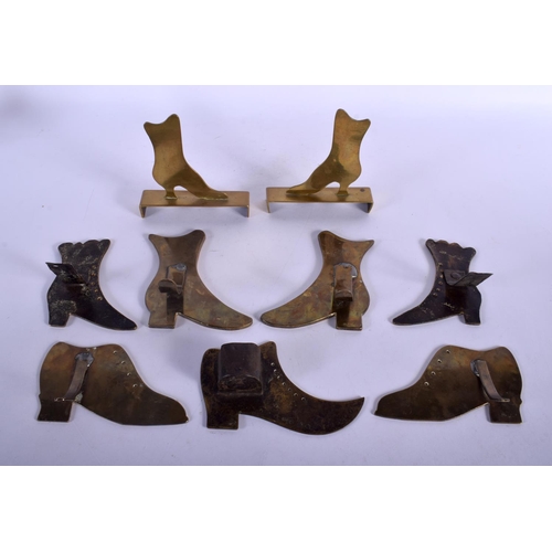 371 - NINE ASSORTED FOLK ART BRASS SHOE STANDS. (9)