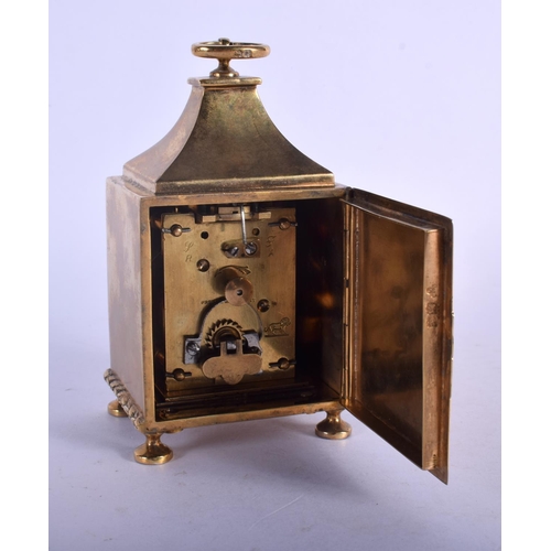 379 - AN ANTIQUE SILVER GILT AND TORTOISESHELL TRAVELLING CLOCK decorated with roundels. 346 grams. 12.5 c... 