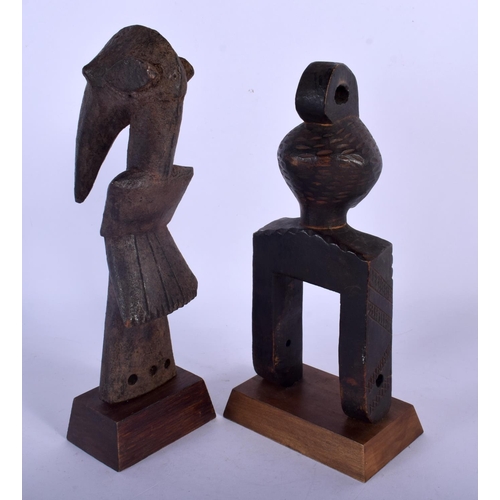 383 - TWO AFRICAN TRIBAL HEDLEY WOOD PULLYS. 25 cm high. (2)