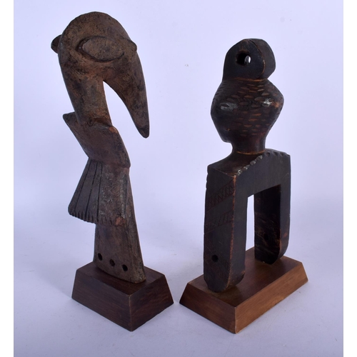 383 - TWO AFRICAN TRIBAL HEDLEY WOOD PULLYS. 25 cm high. (2)
