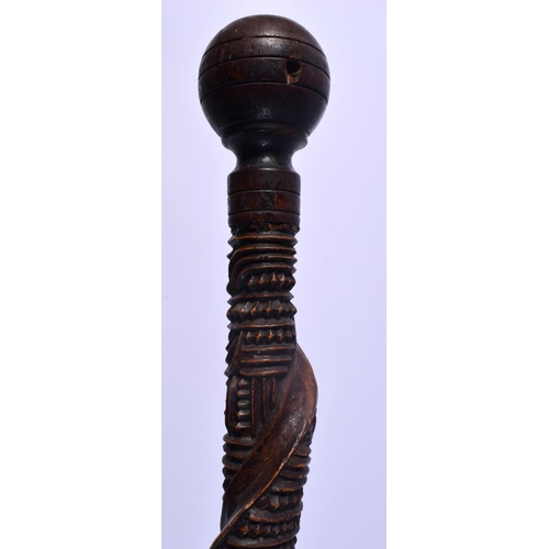 385 - A RARE NEW ZEALAND MAORI CARVED WOOD CHIEFS STAFF with zig zag cut decoration to the body. 75 cm lon... 
