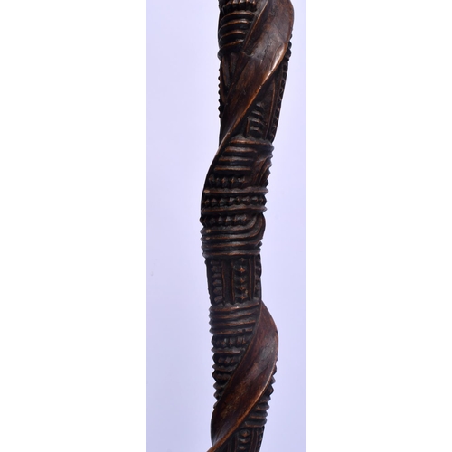 385 - A RARE NEW ZEALAND MAORI CARVED WOOD CHIEFS STAFF with zig zag cut decoration to the body. 75 cm lon... 