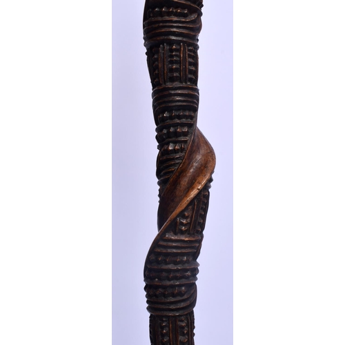 385 - A RARE NEW ZEALAND MAORI CARVED WOOD CHIEFS STAFF with zig zag cut decoration to the body. 75 cm lon... 