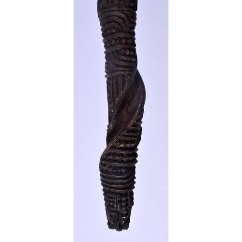 385 - A RARE NEW ZEALAND MAORI CARVED WOOD CHIEFS STAFF with zig zag cut decoration to the body. 75 cm lon... 