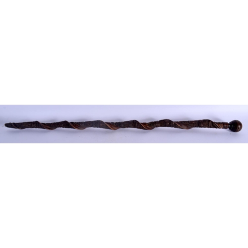 385 - A RARE NEW ZEALAND MAORI CARVED WOOD CHIEFS STAFF with zig zag cut decoration to the body. 75 cm lon... 