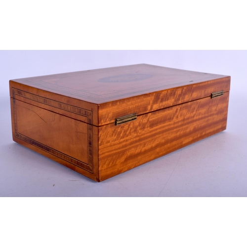 388 - A GEORGE III RECTANGULAR SATINWOOD CARD BOX inset with a shell. 21 cm x 14 cm.