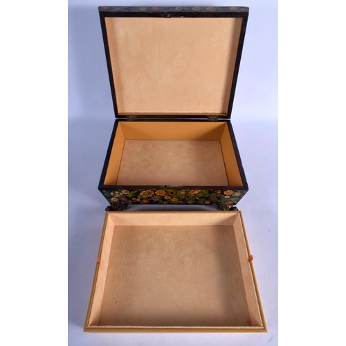 390 - AN UNUSUAL 19TH CENTURY EUROPEAN LACQUERED SQUARE FORM CASKET AND COVER overlaid with Kashmir type l... 