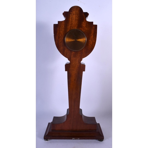 394 - AN ANTIQUE ENGLISH SILVER OVERLAID NEO CLASSICAL MANTEL CLOCK decorated with flowers. 40 cm high.