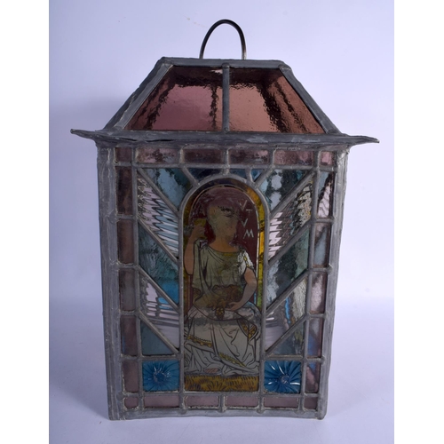 395 - A FINE ARTS AND CRAFTS ENGLISH STAINED GLASS LANTERN decorated with the four seasons. 42 cm x 24 cm.