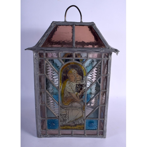 395 - A FINE ARTS AND CRAFTS ENGLISH STAINED GLASS LANTERN decorated with the four seasons. 42 cm x 24 cm.