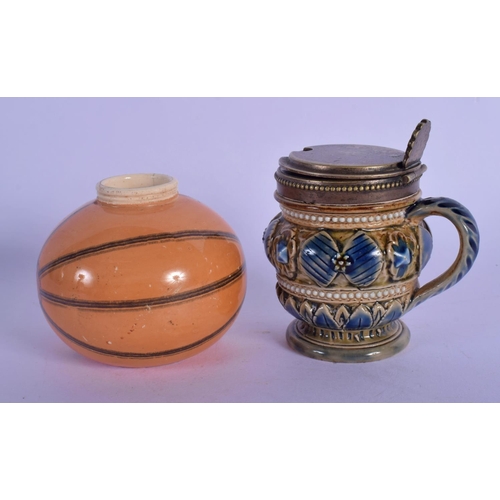4 - A RARE ANTIQUE MACINTYRE SPORTS BALL INKWELL together with a Doulton Lambeth cruet. Largest 6.5 cm w... 