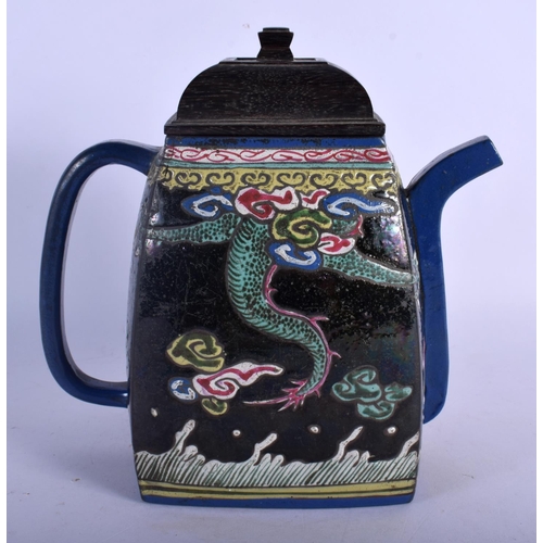 409 - A RARE 19TH CENTURY CHINESE YIXING POTTERY ENAMELLED TEAPOT AND COVER painted with dragons. 19 cm x ... 