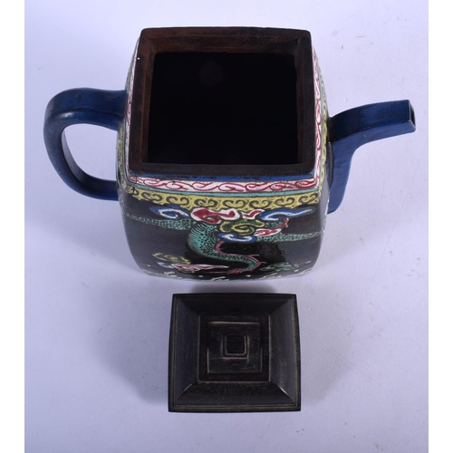 409 - A RARE 19TH CENTURY CHINESE YIXING POTTERY ENAMELLED TEAPOT AND COVER painted with dragons. 19 cm x ... 