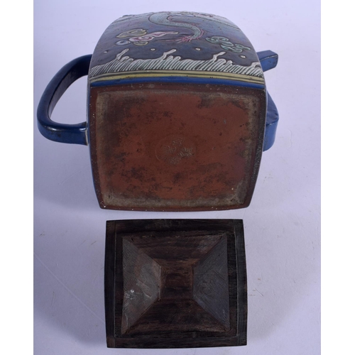 409 - A RARE 19TH CENTURY CHINESE YIXING POTTERY ENAMELLED TEAPOT AND COVER painted with dragons. 19 cm x ... 