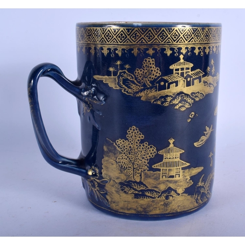 417 - A RARE 18TH CENTURY CHINESE EXPORT POWDER BLUE GROUND MUG Qianlong, gilded with landscapes. 14 cm x ... 