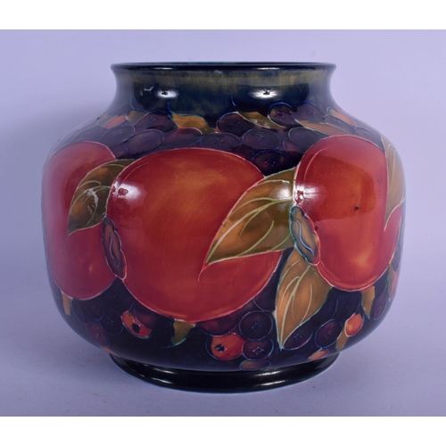 43 - A WILLIAM MOORCROFT POMEGRANATE VASE. 15 cm x 15 cm.