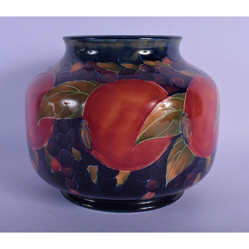 43 - A WILLIAM MOORCROFT POMEGRANATE VASE. 15 cm x 15 cm.