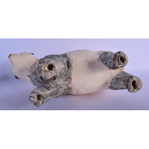 48 - A CONTEMPORARY PAINTED POTTERY MODEL OF A PANDA modelled roaming. 35 cm x 25 cm.