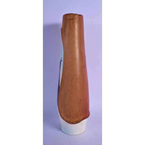52 - A RETRO ITALIAN LEATHER AND PORCELAIN VASE. 33 cm high.