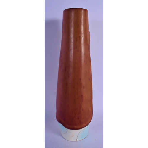 52 - A RETRO ITALIAN LEATHER AND PORCELAIN VASE. 33 cm high.