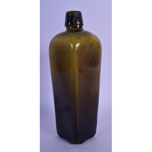 53 - AN 18TH CENTURY WEST INDIAN GREEN GLASS GIN BOTTLE. 25 cm high.