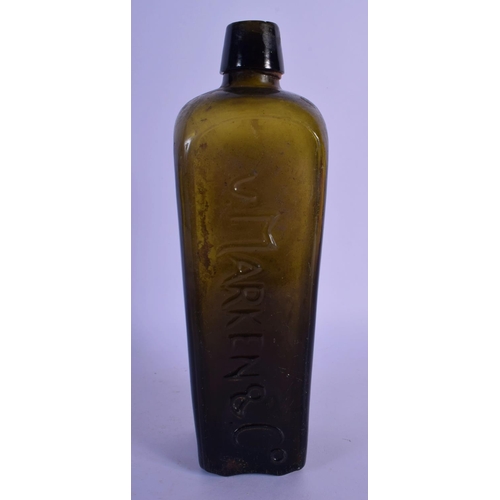 53 - AN 18TH CENTURY WEST INDIAN GREEN GLASS GIN BOTTLE. 25 cm high.