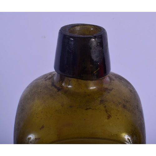 53 - AN 18TH CENTURY WEST INDIAN GREEN GLASS GIN BOTTLE. 25 cm high.