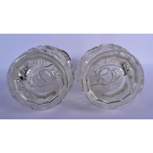 57 - A LARGE PAIR OF ENGLISH SILVER MOUNTED CUT GLASS VASES. 31 cm high.