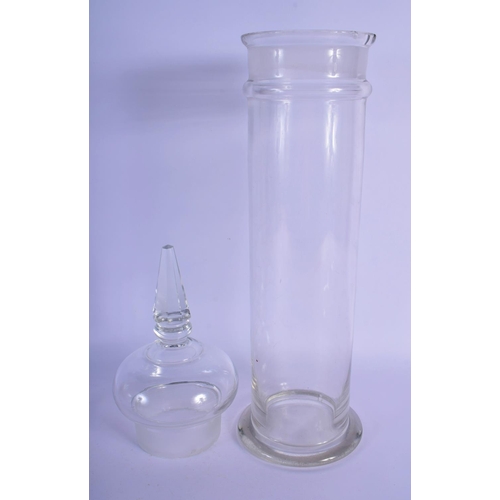58 - A LARGE VINTAGE CHEMIST JAR AND COVER. 54 cm high.
