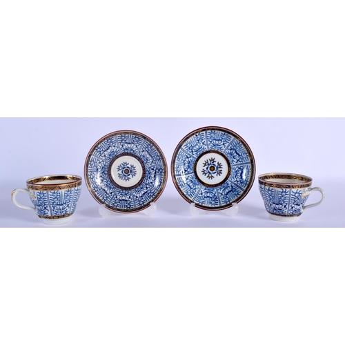 76 - 18TH C. WORCESTER PAIR OF COFFEE CUPS WITH ENTWINED HANDLES AND SAUCER PAINTED WITH ROYAL LILY, CRES... 
