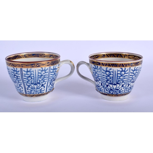 76 - 18TH C. WORCESTER PAIR OF COFFEE CUPS WITH ENTWINED HANDLES AND SAUCER PAINTED WITH ROYAL LILY, CRES... 