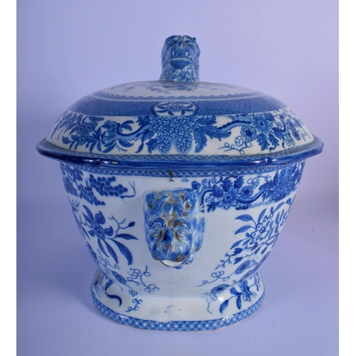 8 - A LARGE EARLY 19TH CENTURY ENGLISH BLUE AND WHITE TUREEN AND COVER decorated with bold foliage. 30 c... 