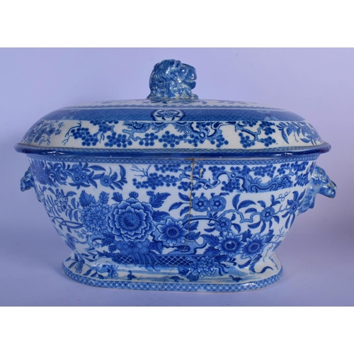 8 - A LARGE EARLY 19TH CENTURY ENGLISH BLUE AND WHITE TUREEN AND COVER decorated with bold foliage. 30 c... 