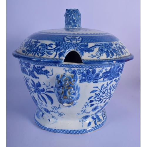8 - A LARGE EARLY 19TH CENTURY ENGLISH BLUE AND WHITE TUREEN AND COVER decorated with bold foliage. 30 c... 